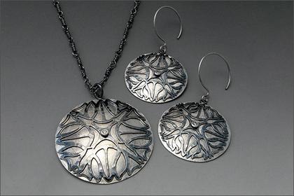 Pabon.Cut Out Pendant and Earrings