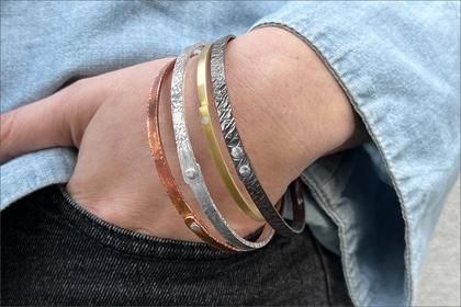 Vanaria.Four Bangle Bracelets