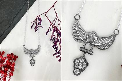Alusitz.silver winged pendant on chain