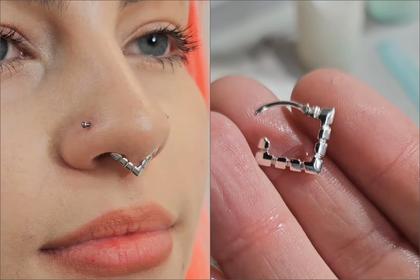 Fentz.silver nose ring on and in hand