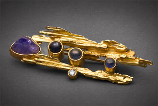 Baird.gold brooch