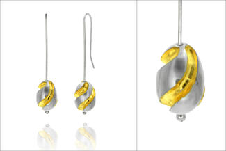 baird.carved pearls with round ear wires
