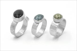 Evans.three cab rings in silver