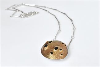 Evans.brass textured pendant
