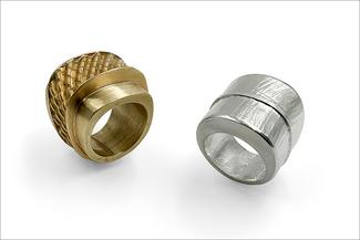 Glimp.Brass and silver rings