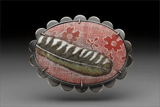 Hur.red enamel with feather