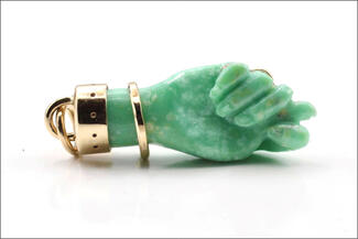 Keast.Carved Hand Pendant