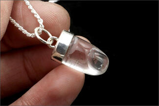 Keast.Carved Thumb Pendant