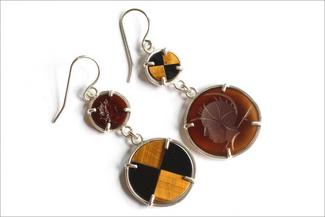 Keast.black and orange circle earrings