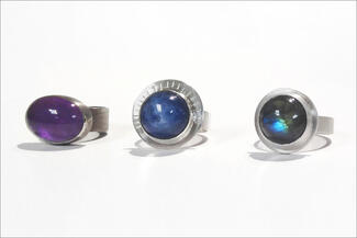Lawton.three rings with stones