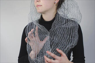Montante.woven wire neck sculpture
