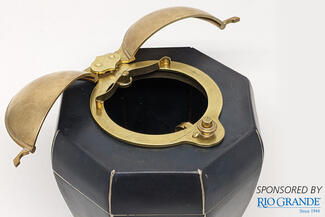 A vessel with hinged lid by Nash Quinn with Rio Grande logo