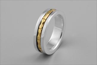 Vanaria.silver and gold spinner ring