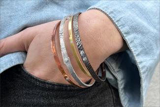 Vanaria.multi color bracelets with rivets