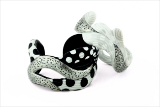 Cuffs by Bonnie Bishoff made with polymer clay and metal