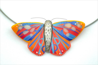 Butterfly necklace by Bonnie Bishoff made with polymer clay and metal