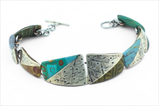 Bracelet by Bonnie Bishoff made with polymer clay and metal