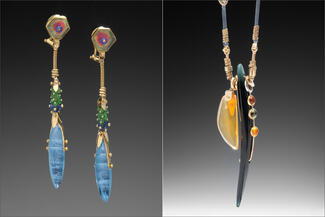 Boyd.blue drop earrings and cycle shaped pendant