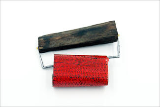Crane.wood and red brooch