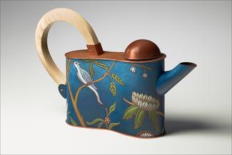 daSilva.blue teapot with bird and plants