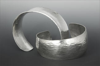 eid.silver cuffs