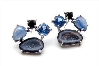 Gollberg.blue prong set stone earrings