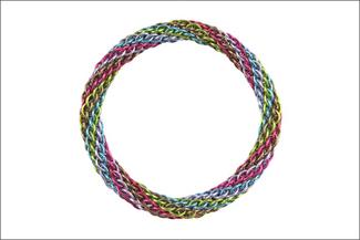 A rainbow colored pencil weave metal bracelet