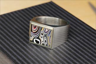 Vanaria.silver hollow ring with fordite