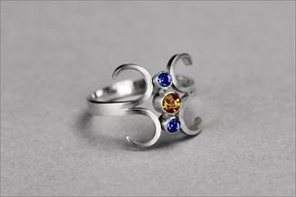 Vanaria.blue and orange tube set silver ring