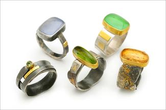 Werger.five sheet metal rings with stones