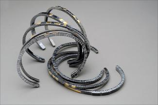 Werger.hammered bracelets with patina
