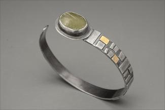 Werger.silver and gold bangle with stone