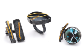Three rings made with keum-boo and reticulation techniques by Paulette Werger